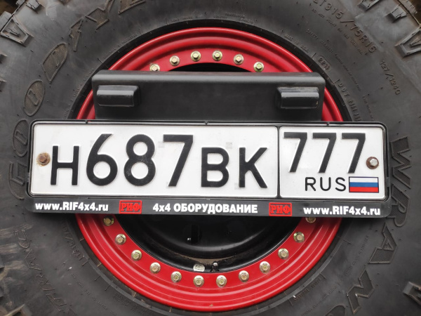 Бампер РИФ задний Mitsubishi L200 2015-2019 с площадкой под лебёдку, квадратом под фаркоп, калиткой, подсветкой номера